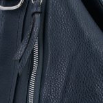 Női hátizsák pasztell színben több zsebbel