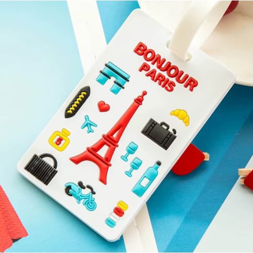 Bőröndcímke repülő stílusban Bonjour Paris dizájnnal fehér színben