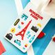 Bőröndcímke repülő stílusban Bonjour Paris dizájnnal fehér színben